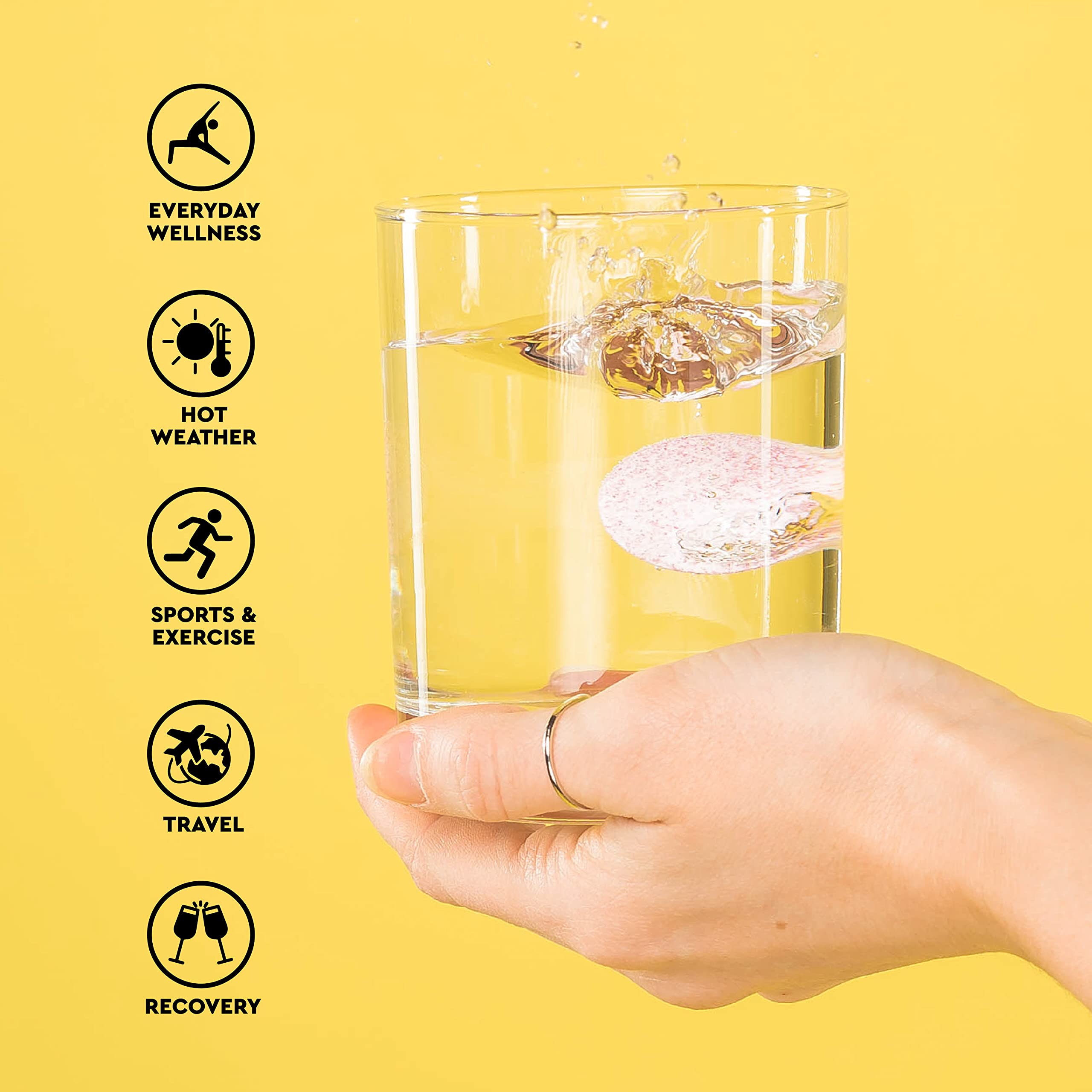 Hand holding glass with dissolving effervescent tablet and icons ORS hydration tablets lemon flavor for sports travel recovery