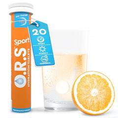ORS sport hydration tablets orange tube with 20 tablets glass of fizzy orange drink and sliced orange