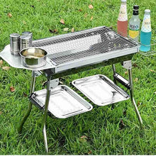 Outdoor barbecue smoker grill with cooking grate, lidded pot, and side shelves