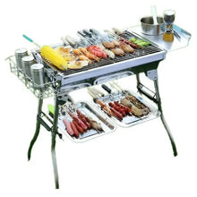 Outdoor barbecue smoker grill with cooking grate and lower warming trays