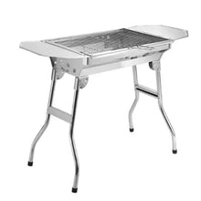 Outdoor portable grill with flat top cover, side handles, and four legs