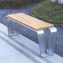 Outdoor bench with light wood slat top and sturdy gray metal legs, 3/4 view