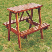 Wooden bench with attached tabletop and slatted bench seating, reddish-brown finish