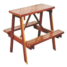 Wooden bench with attached tabletop, slatted seat and backrest in reddish-brown