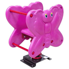 Pink animal spring rider with red handrails and black base, blue eyes