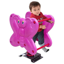 Pink animal spring rider with red rails; child seated and holding handles