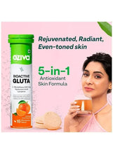 Bioactive Gluta fizzy tablets, green bottle beside glass held by a woman