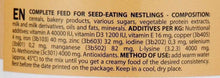 Feeding formula label text on the back of a baby pate container