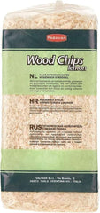 Padovan lemon scented wood chips for small animals in a clear packaging for pet bedding