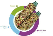 Bird seed mix with berries shown in bowl