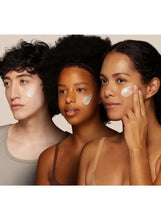 People applying PanOxyl acne wash with white face patches, three adults shown