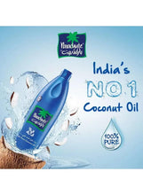 Coconut oil bottle with Parachute logo label and splashes of oil