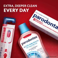 Parodontax toothpaste for gum health. Parodontax Active Gum Health mouthwash toothpaste box and toothbrush on red background