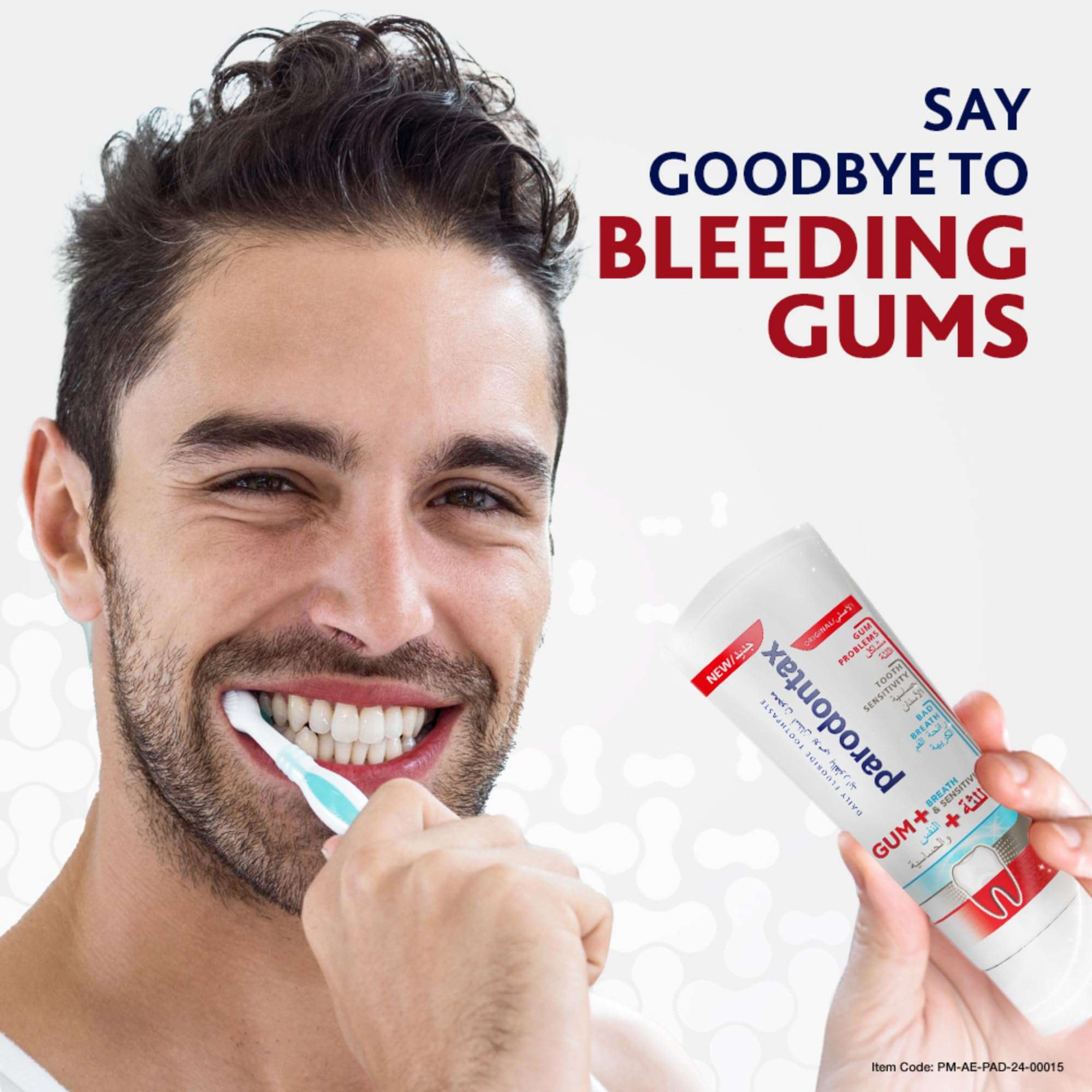 Smiling man brushing his teeth while holding Parodontax toothpaste for gum problems tube to prevent bleeding gums