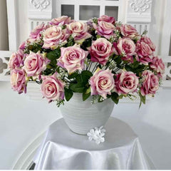 Huitich party decoration artificial flowers with pink roses in white vase on table