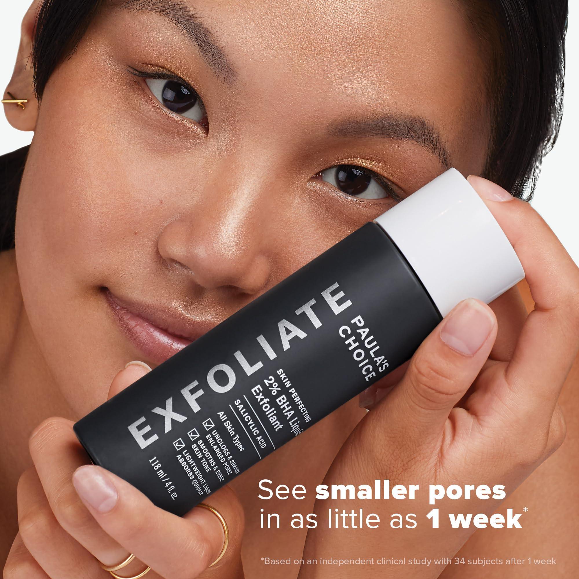 Woman holding PAULA'S CHOICE Exfoliate BHA liquid bottle near face