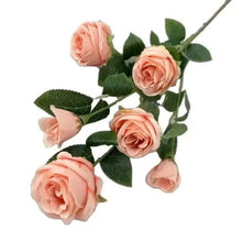 Artificial pink rose stems with five blossoms and green leaves