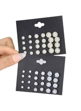 Pearl and crystal stud earring set on two display cards, assorted round studs