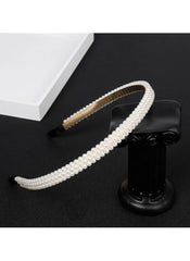 Huitich pearl hair accessory for kids featuring a classic white pearl headband on a black background