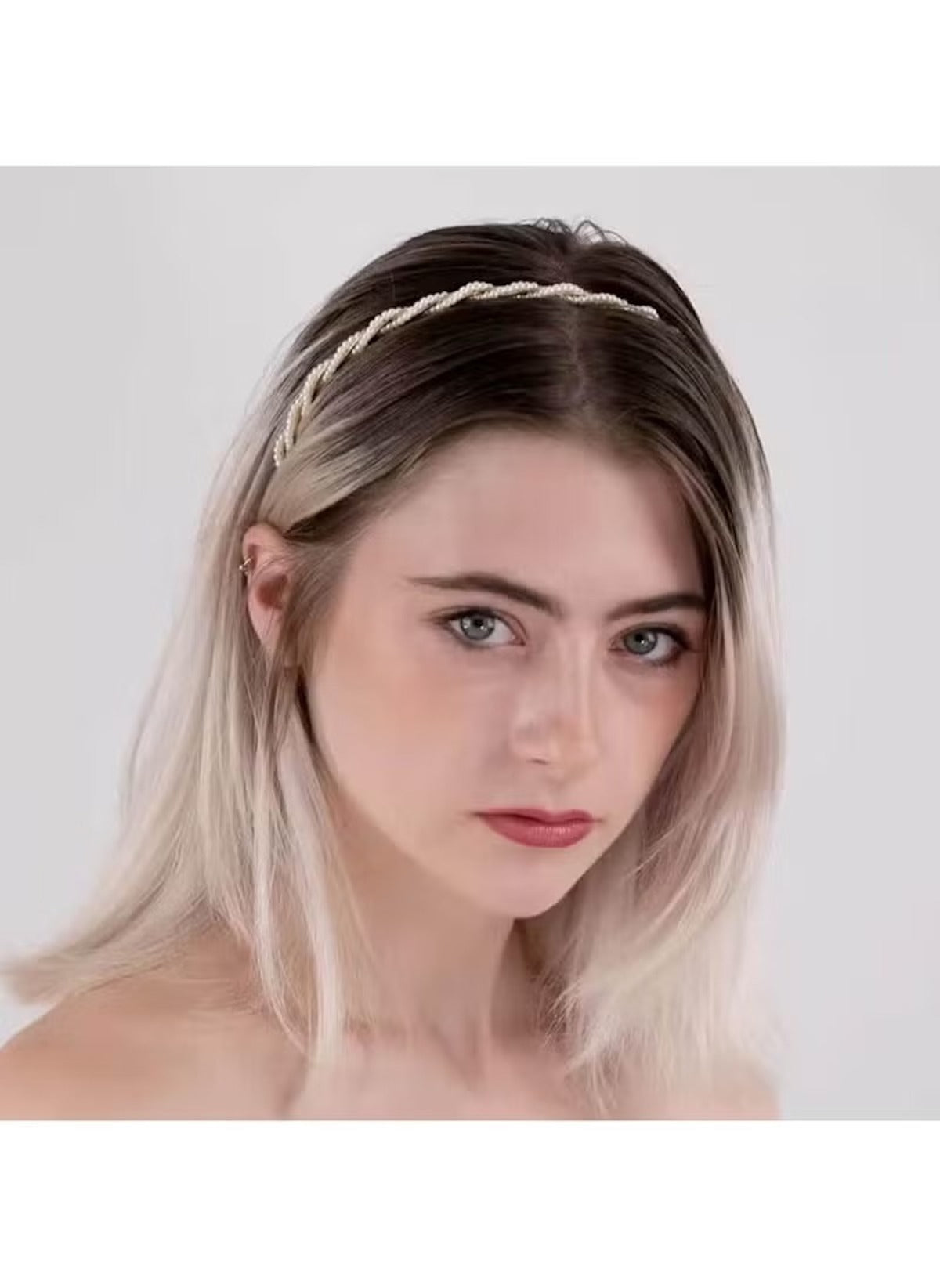 Huitich pearl hair accessory for kids worn by young woman with blonde hair in minimalist style