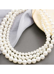 Huitich elegant triple strand pearl necklace with lustrous white pearls on gray background