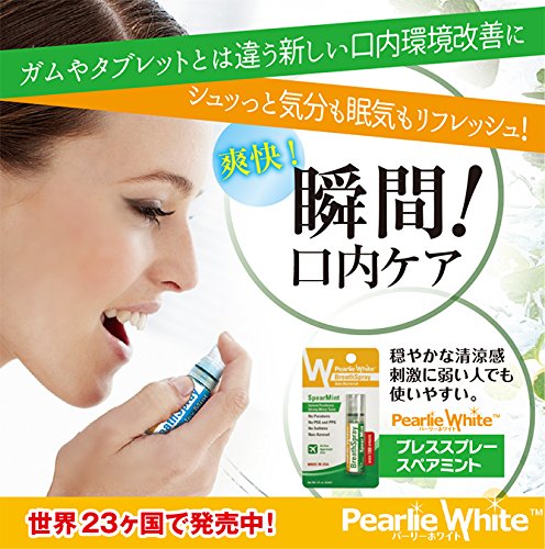 Woman using Pearlie White breath spray Spear Mint small green portable spray for instant fresh breath