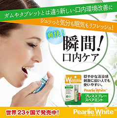 Woman using Pearlie White breath spray Spear Mint small green portable spray for instant fresh breath