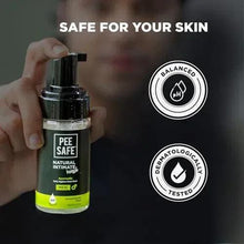 Intimate wash bottle held in hand with pH-balanced and dermatology-tested badges