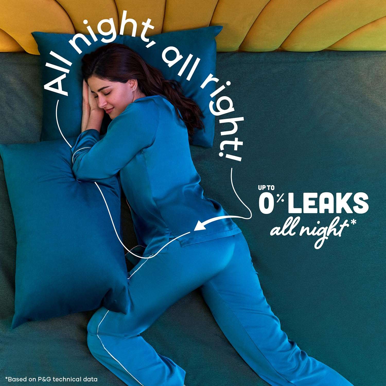Woman sleeping on teal bed in blue pajamas demonstrating Whisper Ultra Night sanitary pads XXL leak protection
