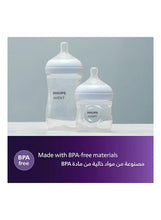 Baby feeding bottle pair, clear bottles with white Philips Avent labels, BPA free