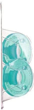 Green Soothie pacifier in a clear plastic blister pack