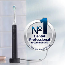 Rechargeable electric toothbrush with black handle and standing charging base