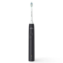 Rechargeable electric toothbrush with black handle and white bristle head