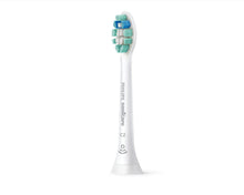 Toothbrush with multicolor bristle head on white handle