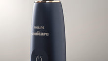 Midnight blue Philips Sonicare 9900 Prestige handle with power icon