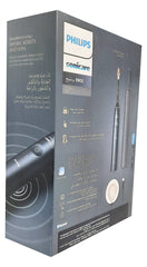 Boxed Philips Sonicare 9900 Prestige toothbrush packaging showing black handle brush head and charging dock