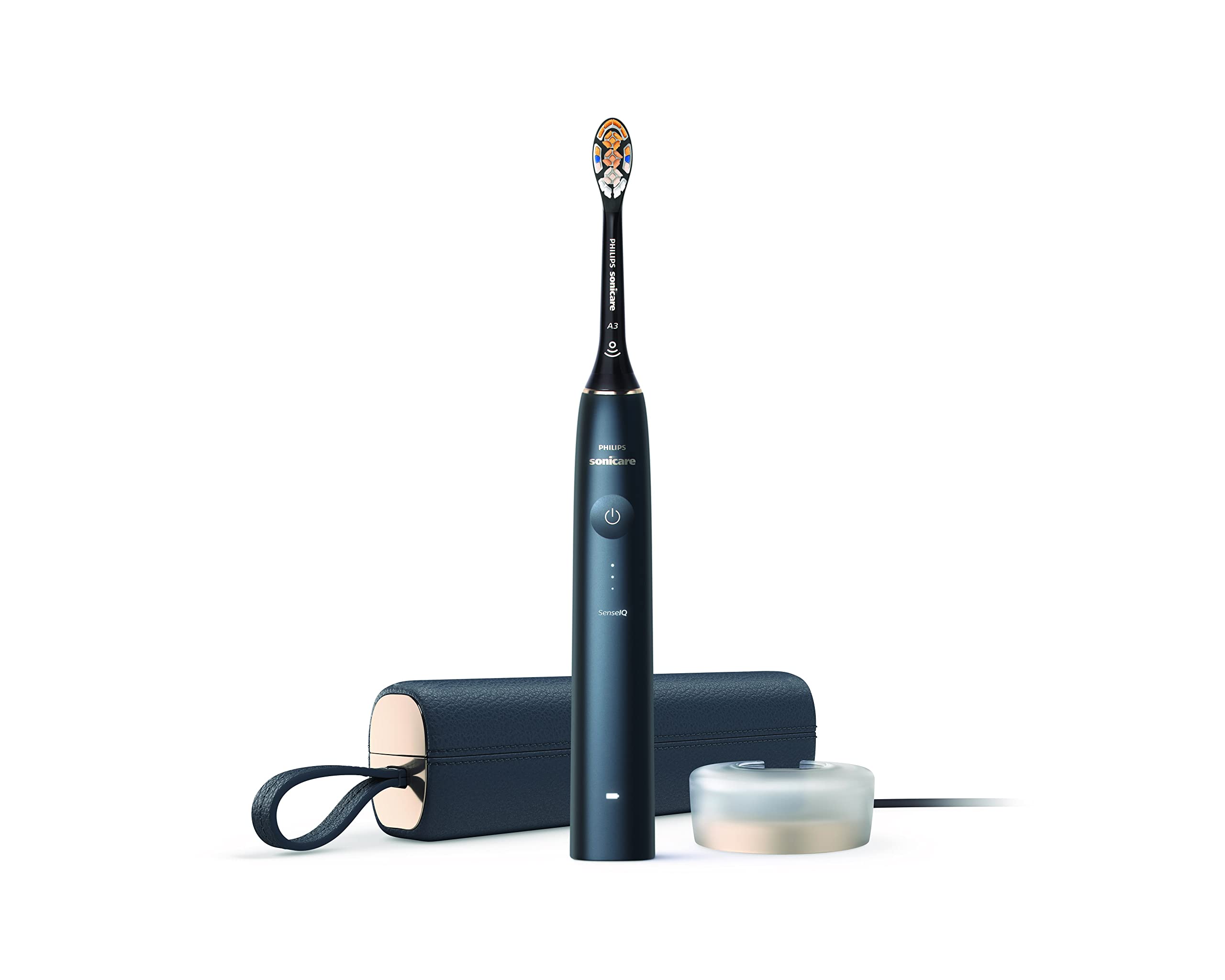 Philips Sonicare 9900 Prestige toothbrush in navy with travel case and charging glass on white background