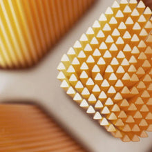 Toothbrush bristle tips on Sonicare brush head, dense triangular bristles