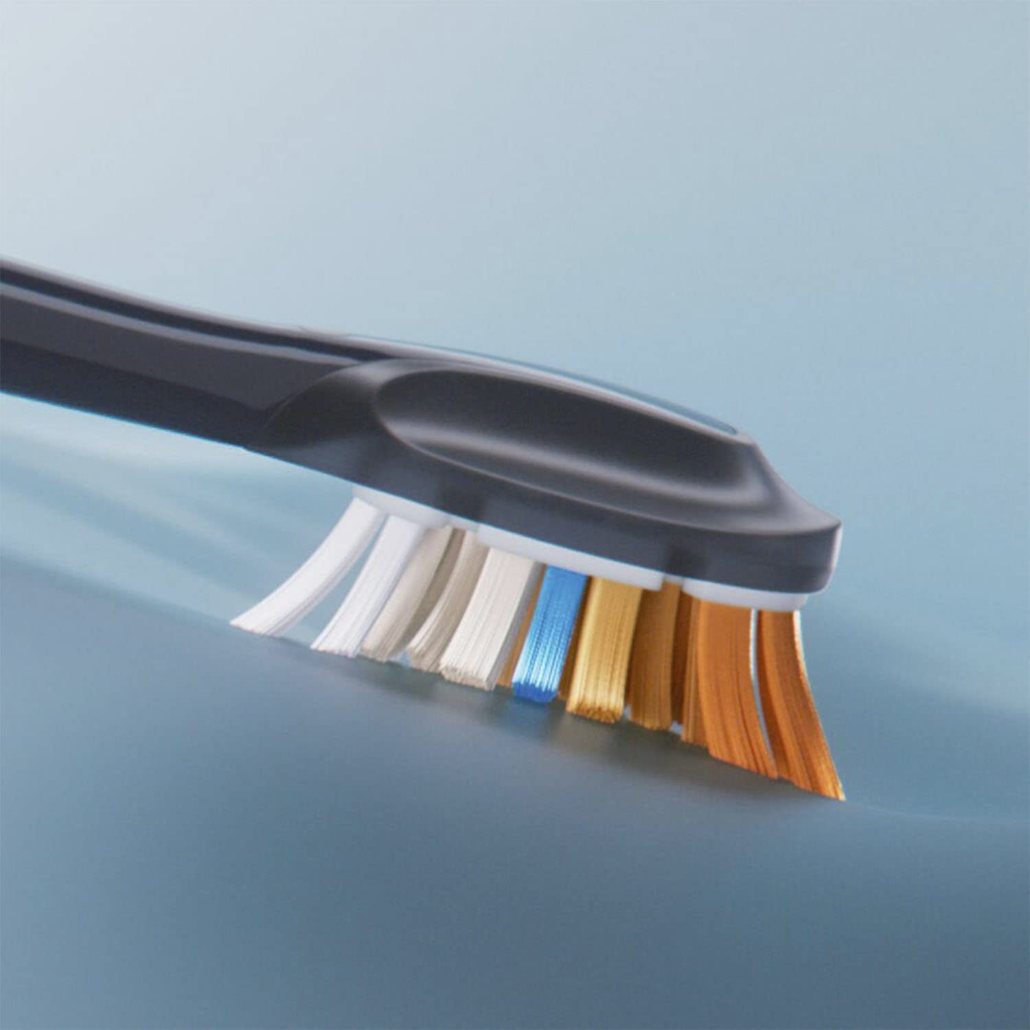 Close up of Philips Sonicare Premium brush heads on a black handle with multicolor bristles