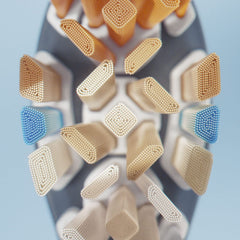 Close up of Philips Sonicare Premium brush heads showing multi angled soft bristles and blue indicator tufts