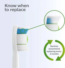 Toothbrush replacement head showing layered bristle wear indicator