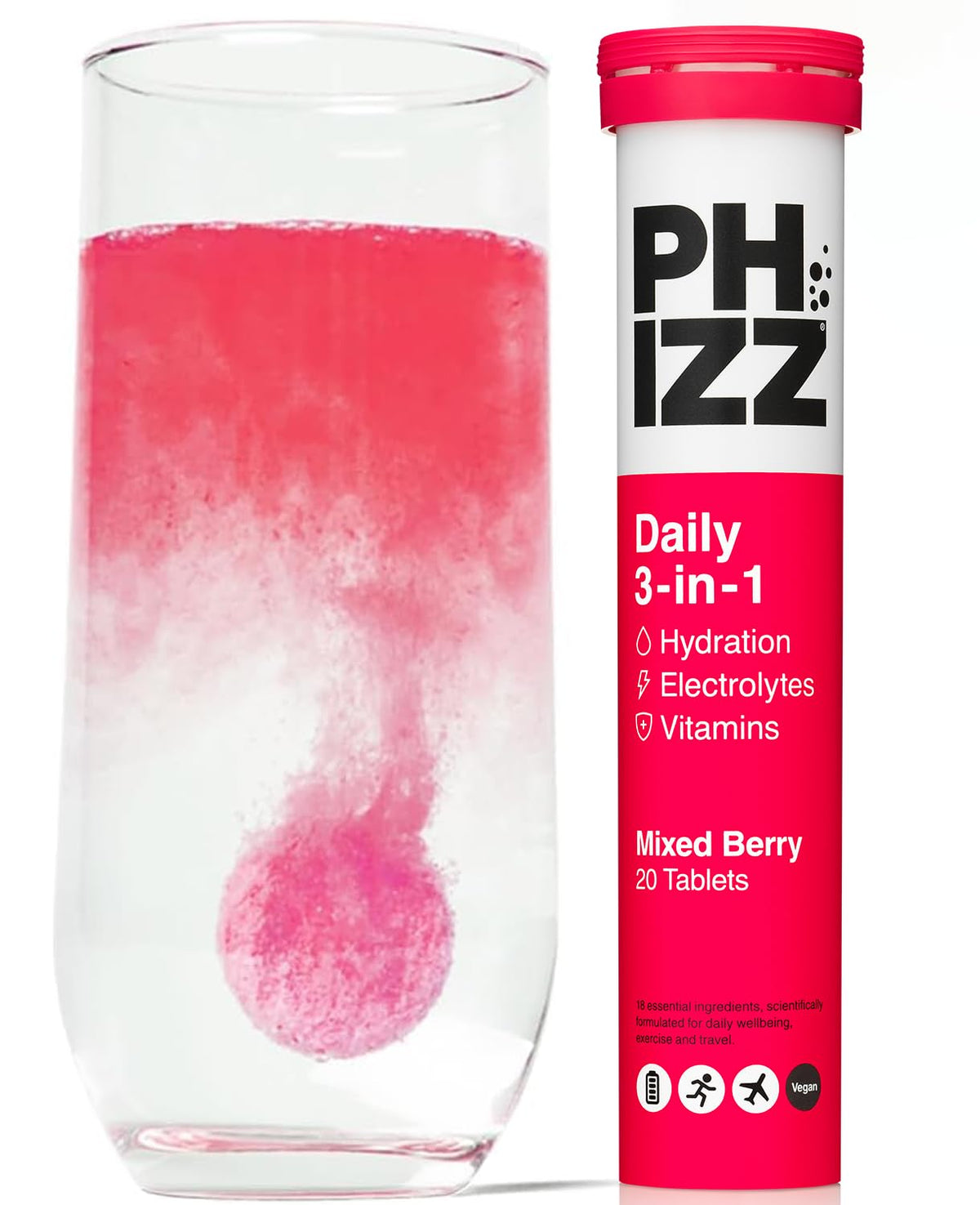 Phizz mixed berry electrolyte hydration tablets tube beside glass with pink tablet dissolving into water
