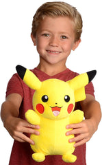 Child holding a yellow 8 inch Pikachu stuffed animal with black-tipped ears and red cheeks