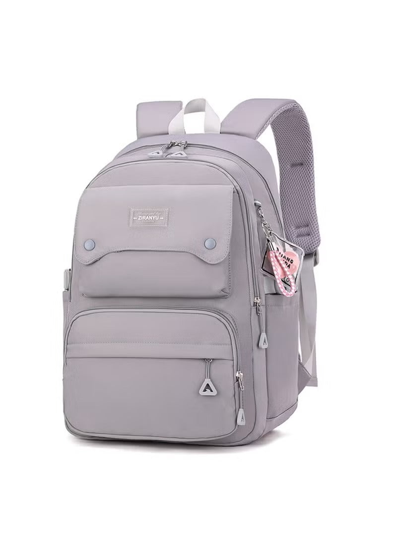 Stylish pink and grey school backpack with multiple compartments and durable design