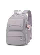 Grey school backpack with front zip pockets and padded shoulder straps