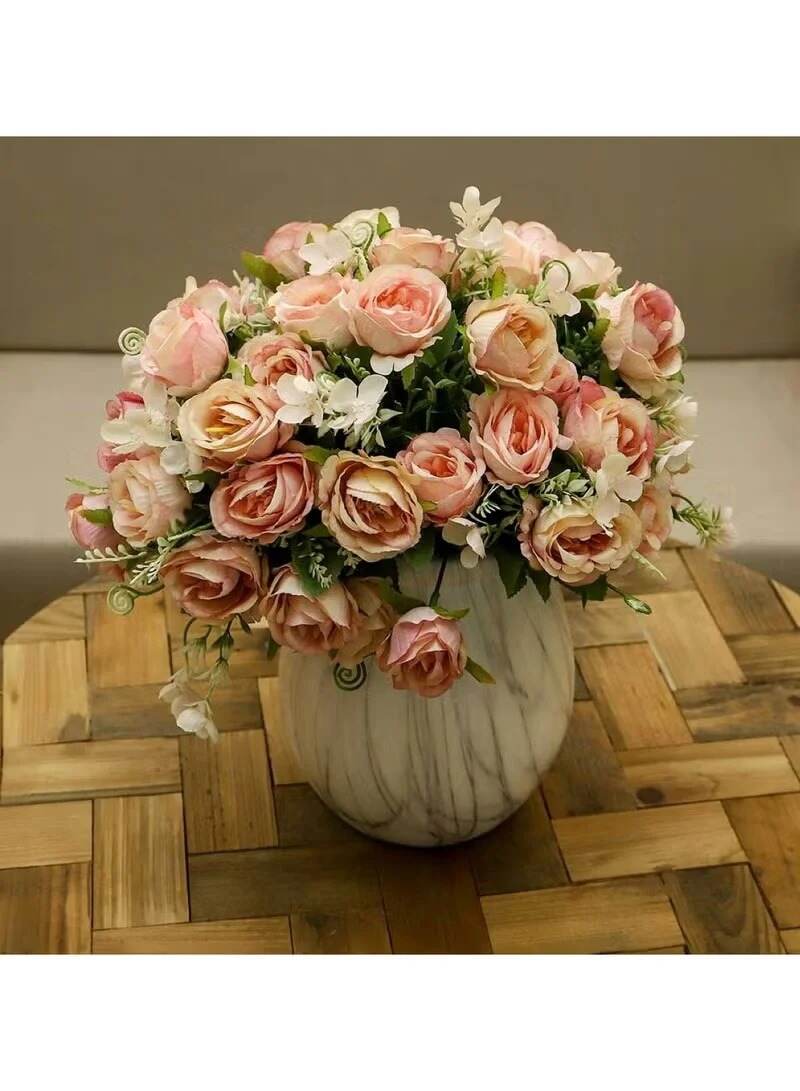 Huitich pink artificial rose bouquet arranged in a white marble vase on a wooden table