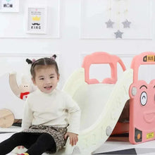 Pink bus-themed kids slide with white ramp and bus-shaped side panels