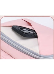 Interior view of a pink diaper backpack for moms showing a pocket with a black organizer