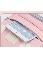 Pink diaper backpack for moms with a secure front pocket for tablet or phone storage