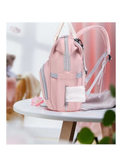 Pink diaper backpack for moms featuring multiple pockets and easy access wipes compartment